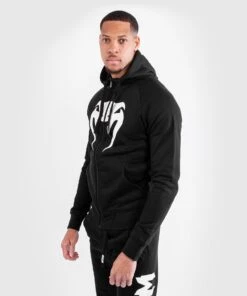 Venum Hoodie Legacy - Black/white -Boxing Equipment Store f2c4ce25304963c0b48d35a214cd2933977c1239 HOODIES LEGACY BLACK WHITE 02